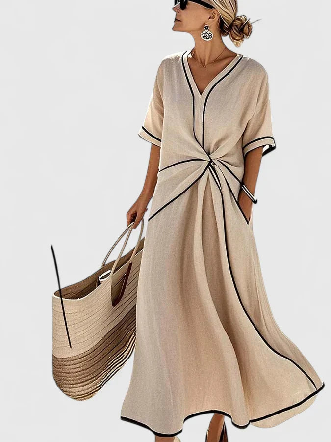 Comfortable and elegant women's striped midi dress. Short sleeve design offers chic fashion for summer and vacation.