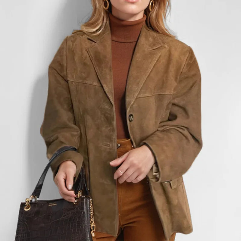 Fashionable long sleeve women's suede blazer, versatile outerwear for an elegant, polished look.