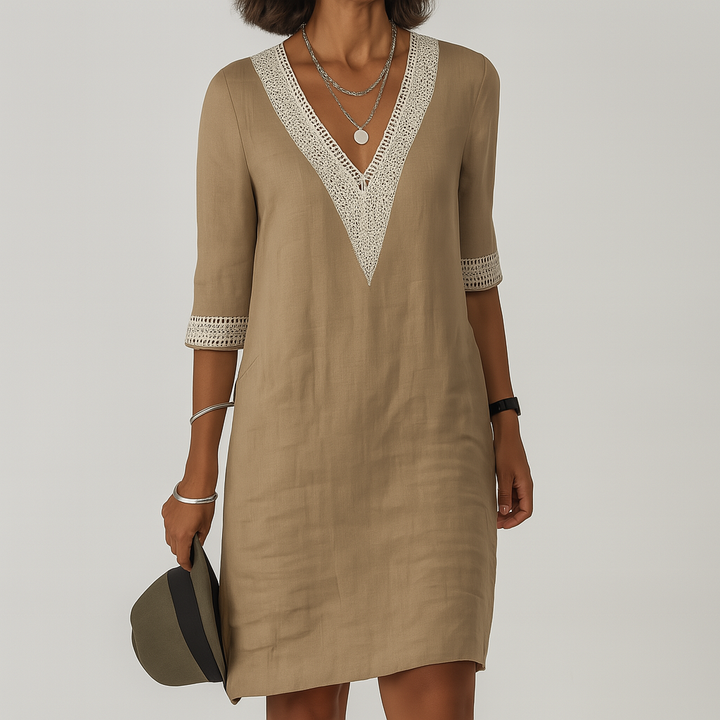 Elegant women's summer midi dress in a relaxed fit, perfect for warm weather and effortless everyday fashion.