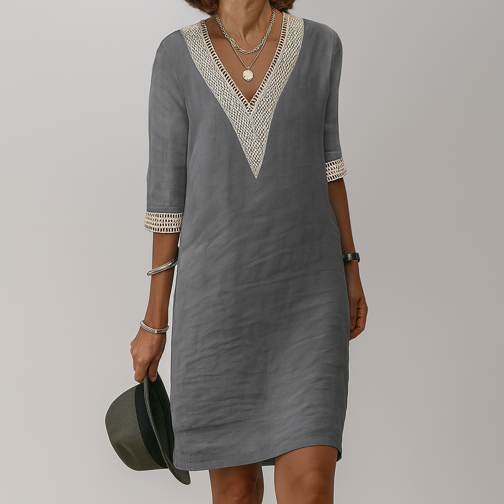 Relaxed fit women's summer midi dress, offering effortless elegance and comfort for casual everyday wear.