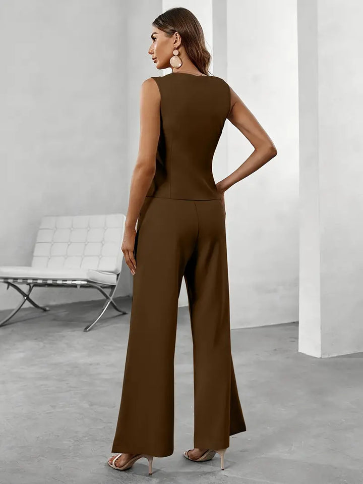 Chic women's tailored suit set with blazer and trousers, a stylish & versatile formal outfit.