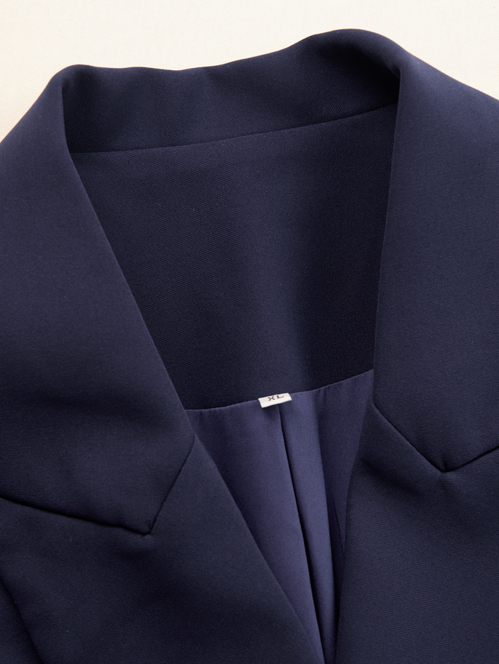 Fashionable women's long sleeve tailored blazer midi dress, elegant and sophisticated for business and formal settings.