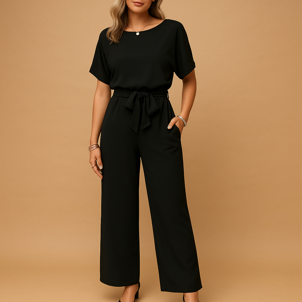 Sophisticated women's tailored jumpsuit for evening wear, featuring stylish flowy sleeves & a chic silhouette.
