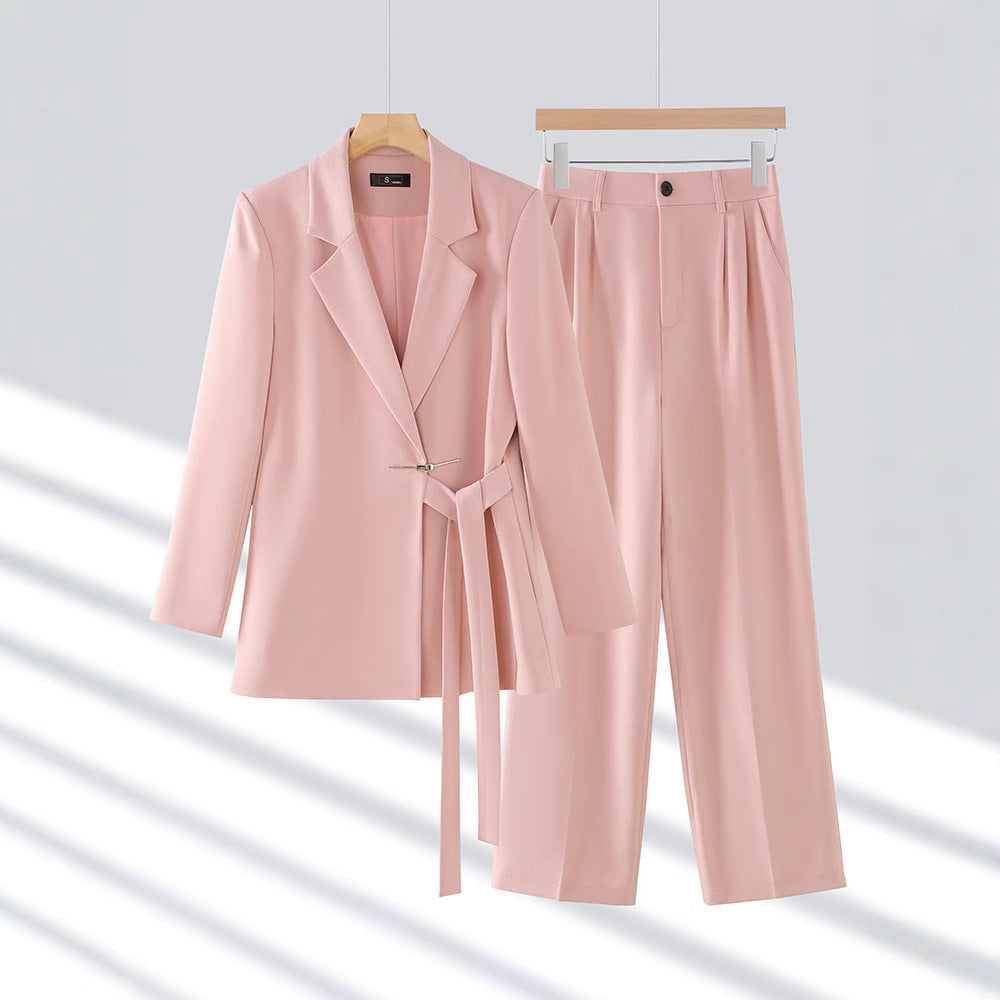 Elegant women's tailored suit set with long blazer, perfect for business or formal wear