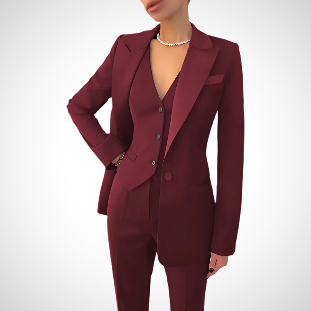 Stylish women's power suit featuring a fitted blazer, vest, and smart trousers for office & versatile wear.