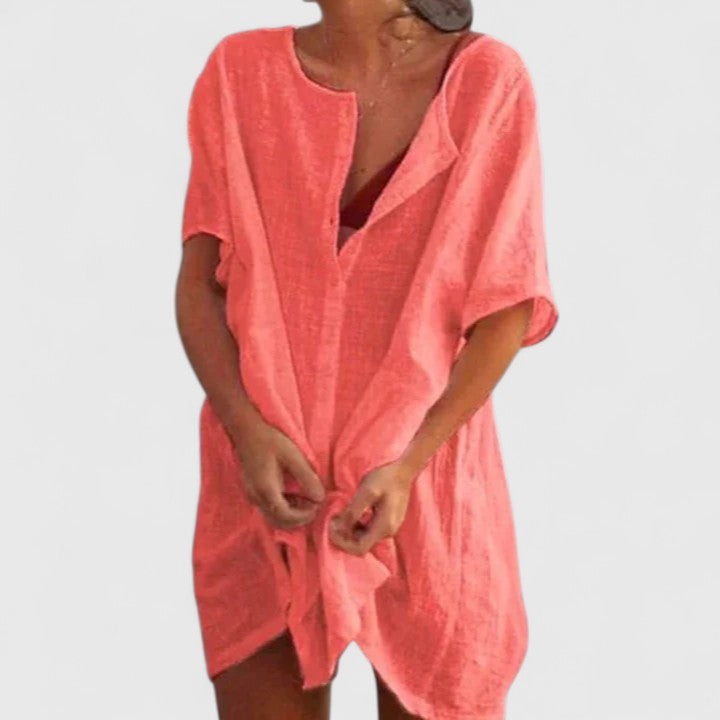 Lightweight women's tunic dress. Elegant summer style, perfect as beachwear or a sophisticated casual outfit.