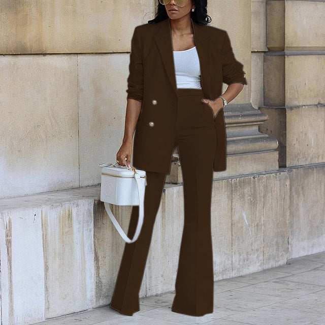 Women's elegant trouser suit: a fashionable two-piece blazer and pant set for business and professional attire.