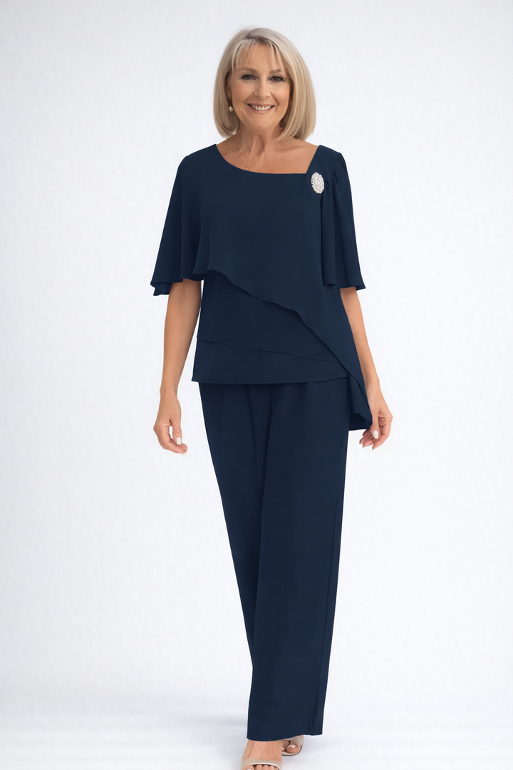 Light blue women's elegant cape top & straight-leg trouser set, ideal for wedding guests & evening attire.
