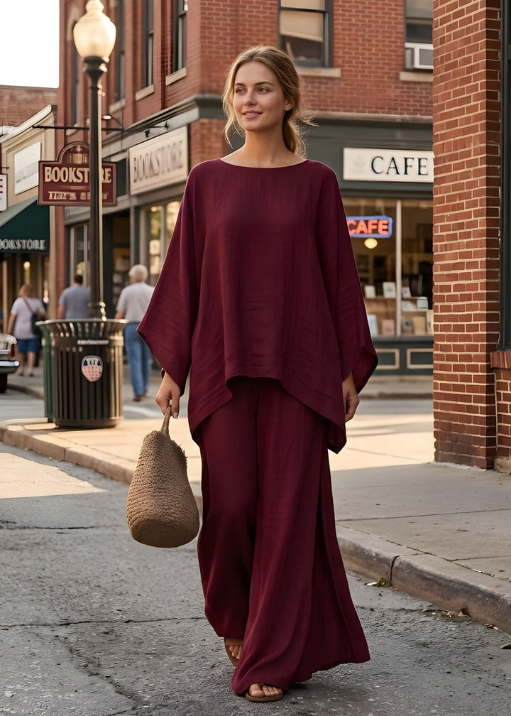 Women's elegant lounge wear set: a comfortable, flowing cape top paired with fashionable wide-leg pants.
