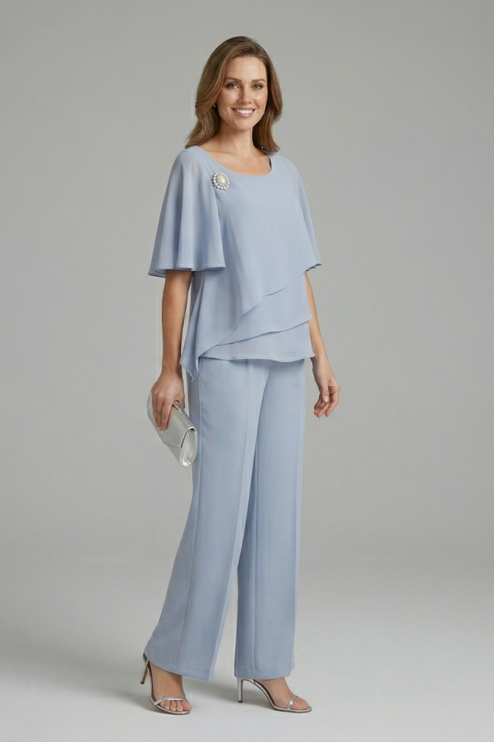 Women's elegant layered top with modern straight leg trousers, a stylish two-piece set for summer casual wear.