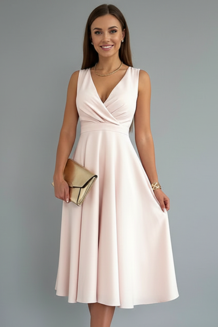 Flattering A-line V-neck midi dress for women. Elegant sleeveless cut, ideal for chic spring fashion.
