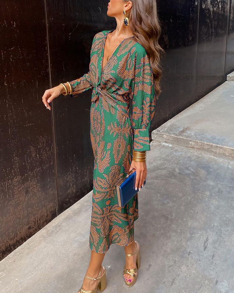 Stylish women's long sleeve V-neck midi dress featuring a chic knotted waist, ideal for versatile fall fashion.