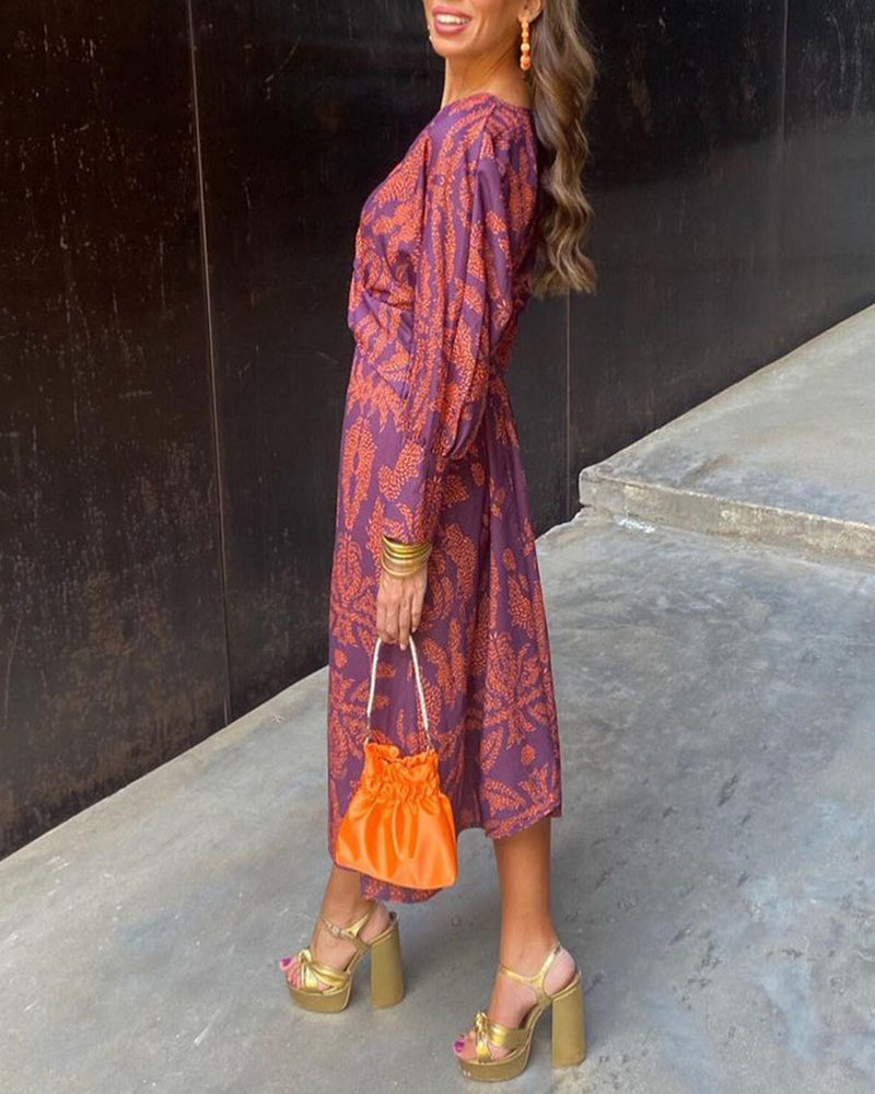 Boho chic women's V-neck long sleeve midi dress with a trendy knotted waist, a versatile and elegant fall outfit.