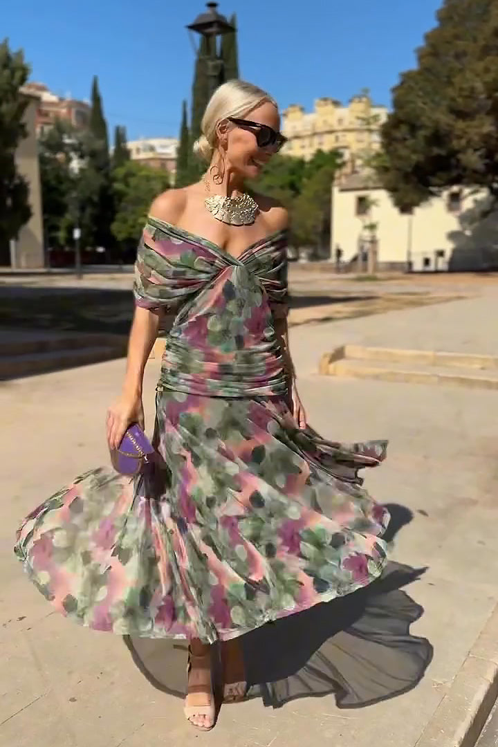 Stylish women's V-neck wedding guest maxi dress featuring delicate draped sleeves and an elegant silhouette.