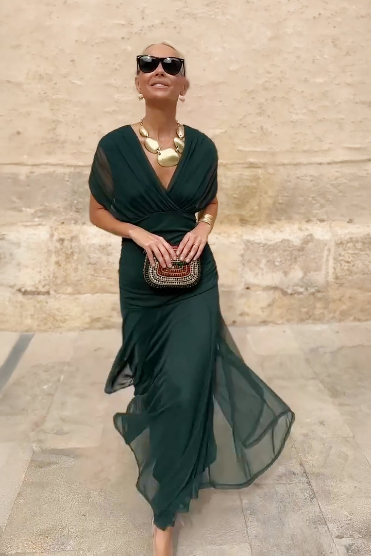 Sophisticated women's V-neck maxi dress with unique draped sleeves, suitable for formal evening events.