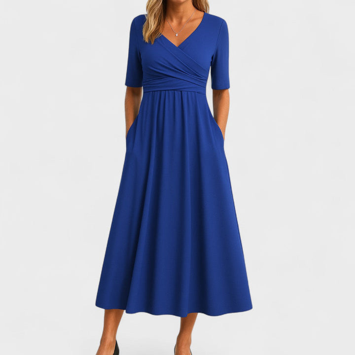 Women's elegant V-neck midi dress, a stylish choice for cocktail and formal events.