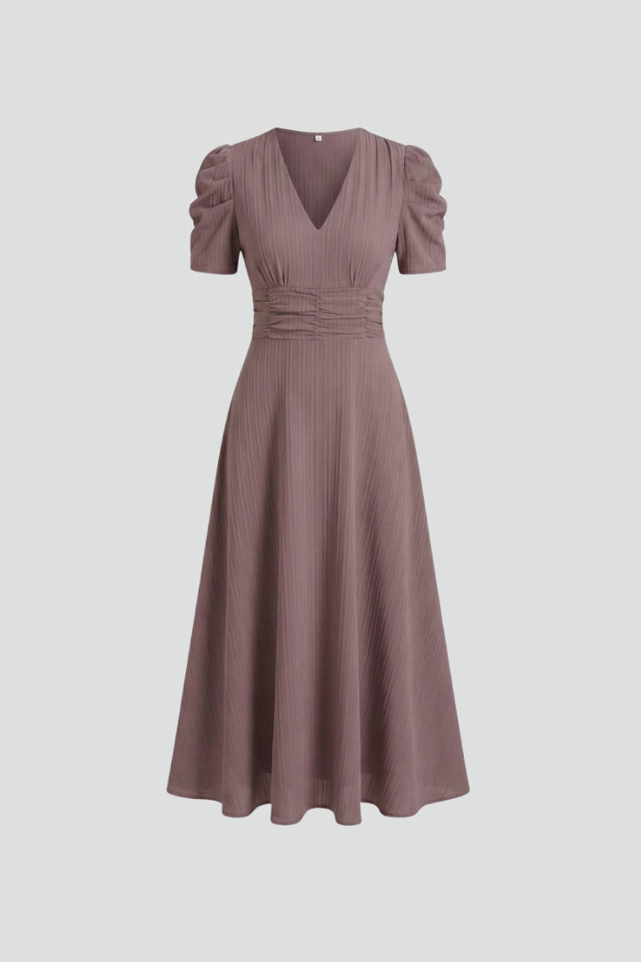Elegant women's V-neck midi dress with short sleeves, flowy fabric, perfect for spring/summer casual chic.