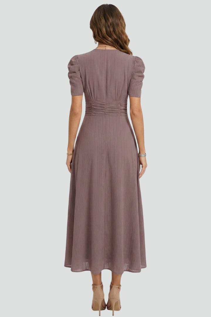 Chic women's flowy V-neck midi dress with short sleeves. Elegant silhouette & comfortable fabric for any occasion.