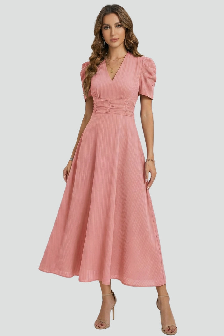 Flowy women's V-neck midi dress with short sleeves, elegant design & soft fabric. Perfect for effortless summer style.