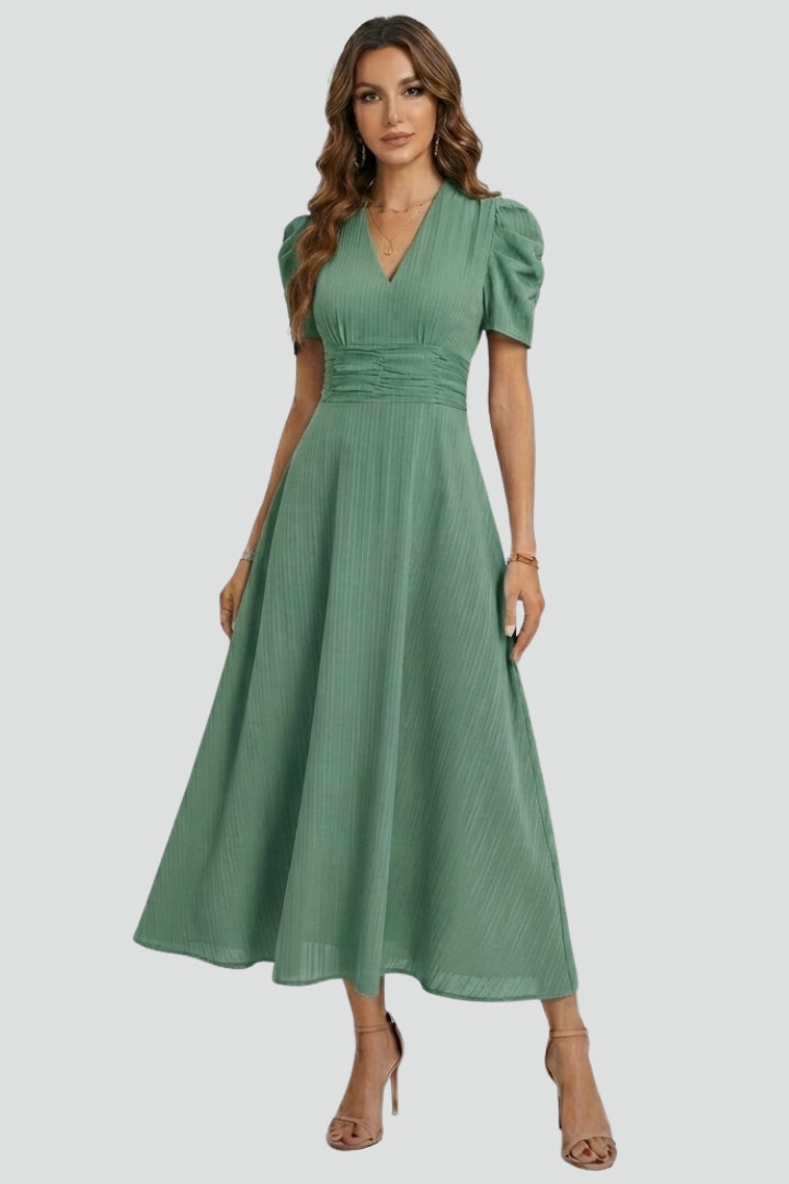 Women's elegant V-neck midi dress, short sleeves, flattering ruched waist. Casual chic for spring & summer fashion.