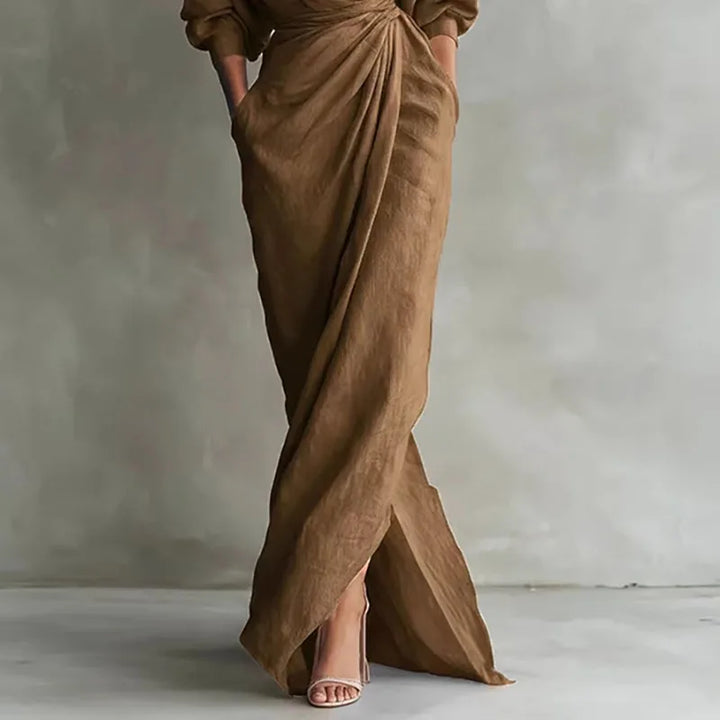 Black elegant V-neck wrap long dress for women, ideal as a formal evening gown or sophisticated party wear.