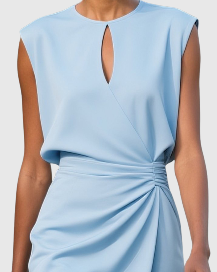 Flattering women's knee-length dress featuring a stylish keyhole neckline and sleeveless design for all occasions.
