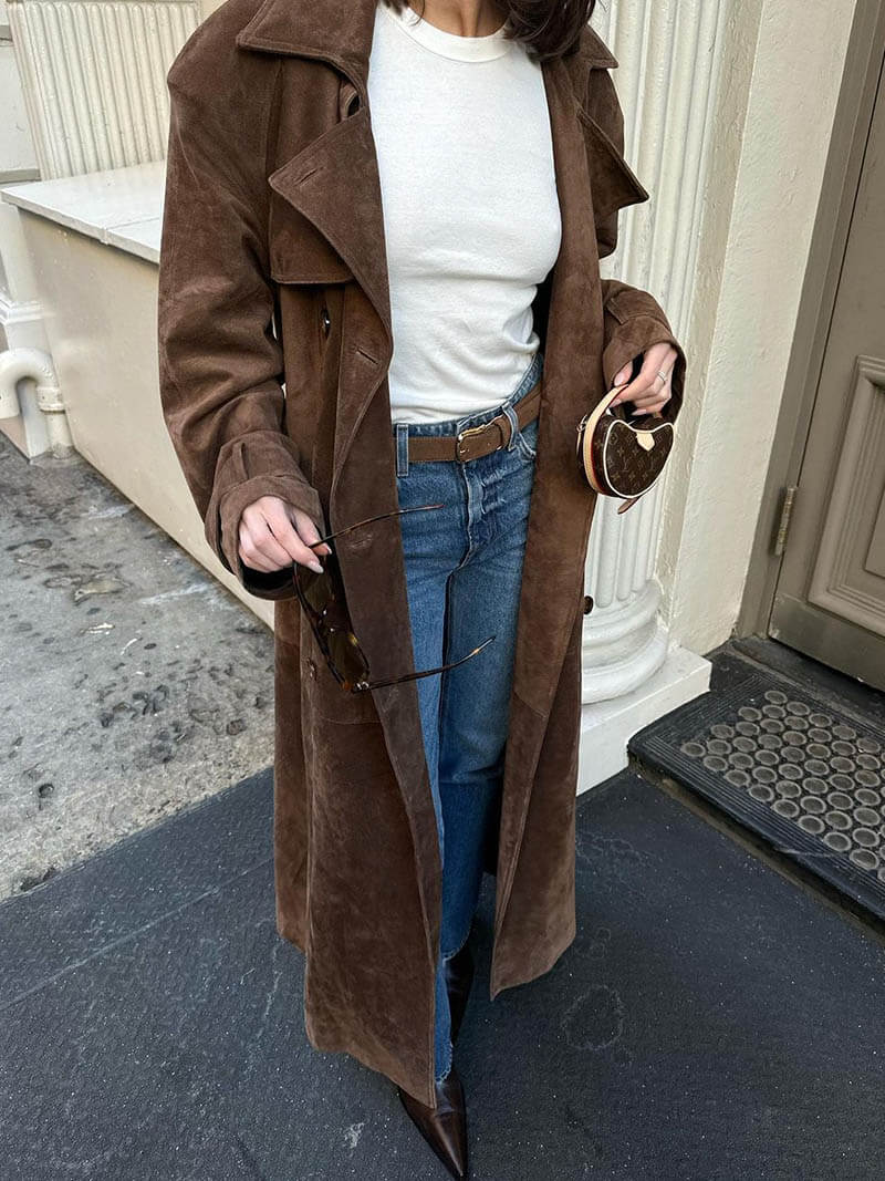 Women's long warm belted trench coat with a stylish collar, ideal for winter fashion.