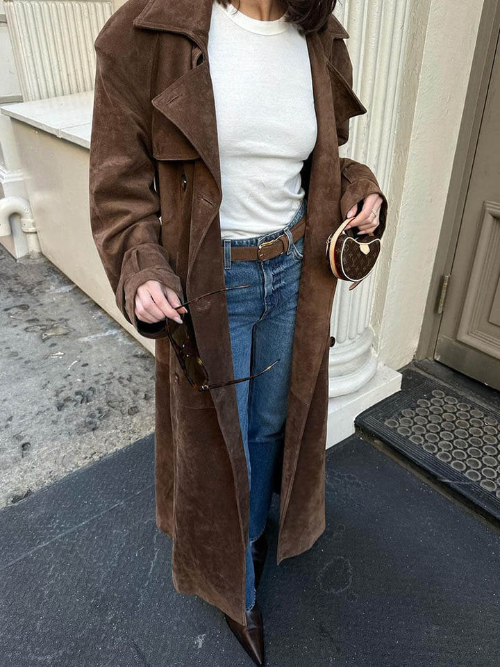 Women's long warm belted trench coat with a stylish collar, ideal for winter fashion.