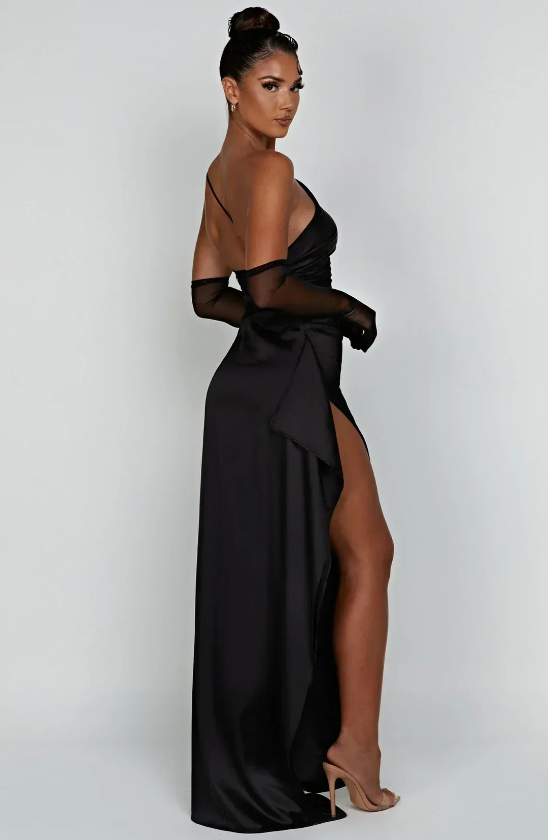 Formal white one-shoulder maxi dress, featuring a draped design, an elegant women's evening wear option.