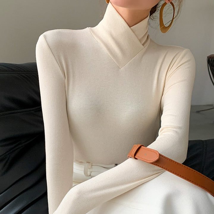 Elegant women's white mock neck long sleeve top, perfect for sophisticated spring fashion & versatile casual or formal wear