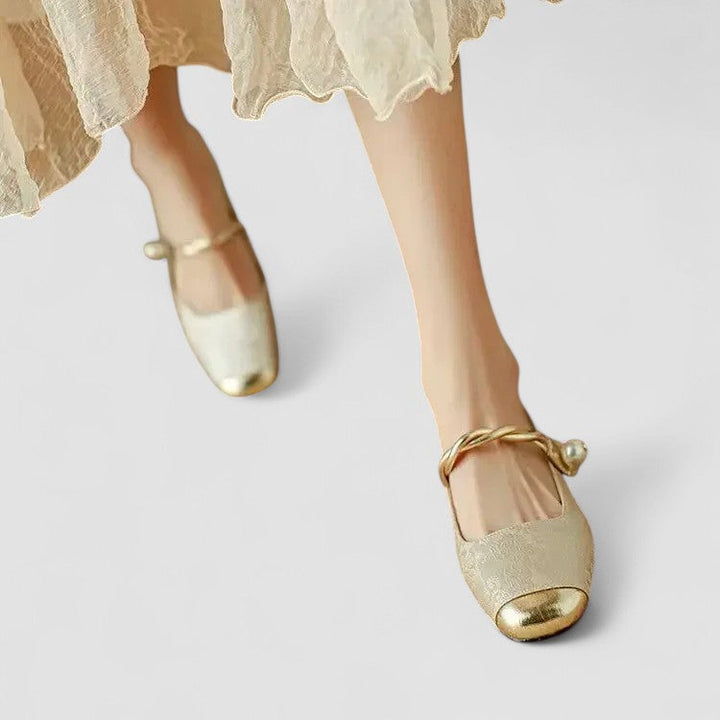 Rear view of women's chunky block heels with shimmering pearl ankle straps