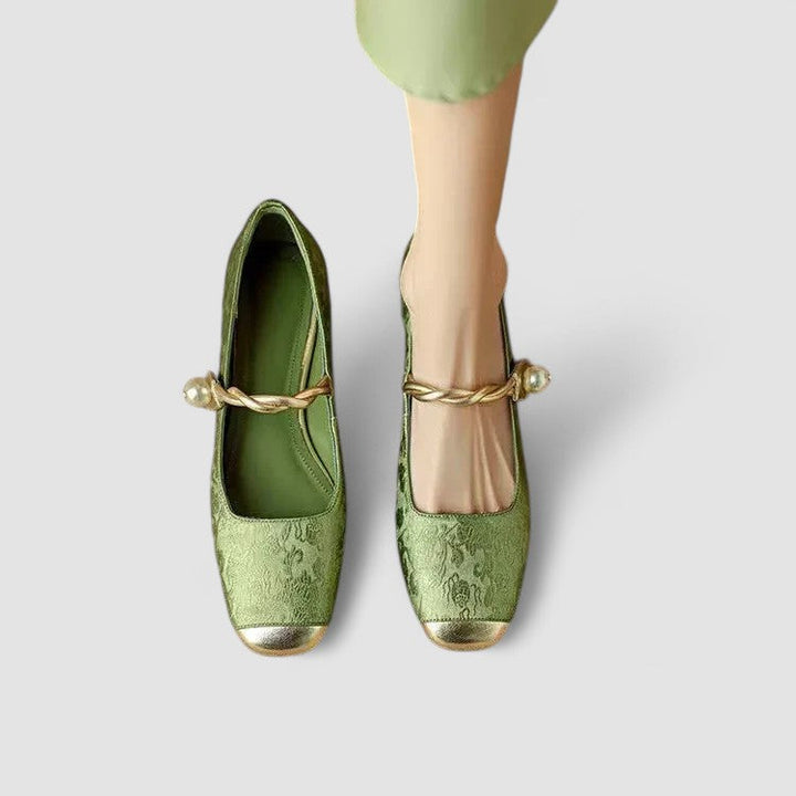 Stylish women's nude block heels with delicate pearl straps, perfect for weddings