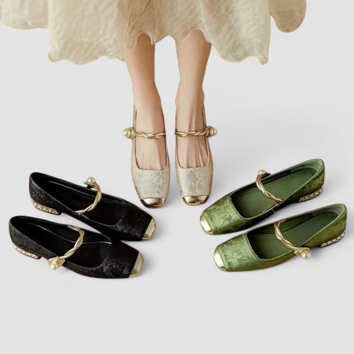 Close-up of pearl embellished strap on women's elegant block heel, detailed view