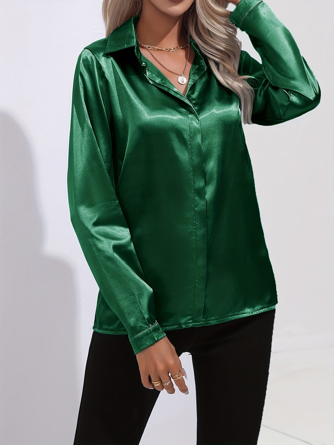 Women's crisp white satin long sleeve button down blouse, an essential and elegant wardrobe piece.
