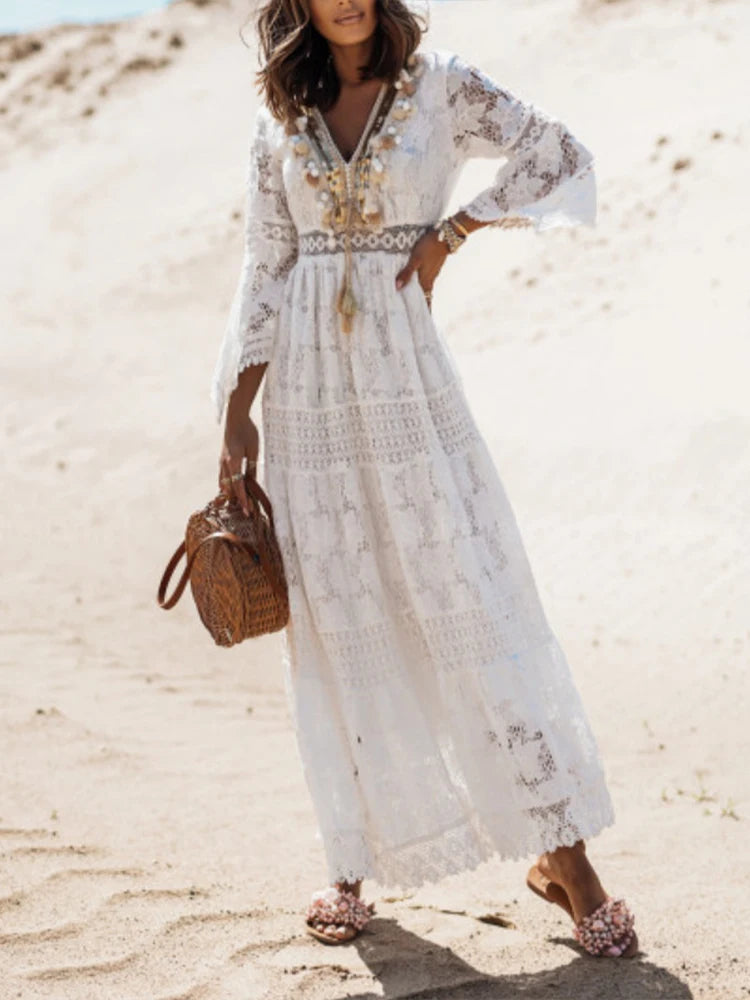 Elegant women's white V-neck tiered maxi dress with long sleeves, perfect for versatile fashion.