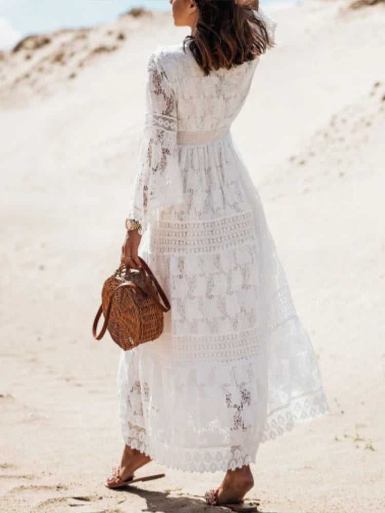 White V-neck tiered long sleeve maxi dress for women, featuring a flowy and versatile design.