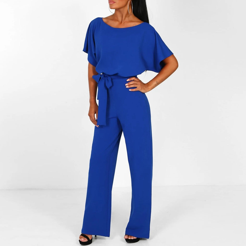 Fashionable women's wide leg belted jumpsuit. Chic boat neck design makes it an elegant choice for summer and spring fashion.