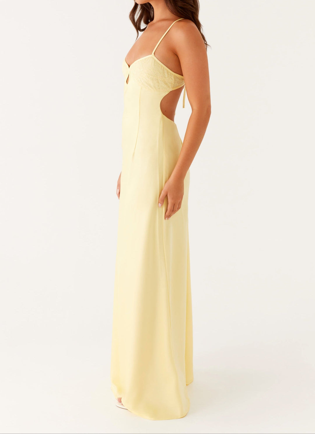 Vibrant yellow halterneck maxi dress for women, ideal as a formal or elegant evening gown.