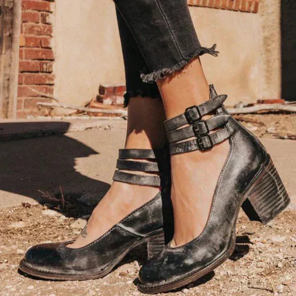 "Elegant women's block heel ankle boots in black, with round toe and back zipper, perfect for chic and comfortable wear."
