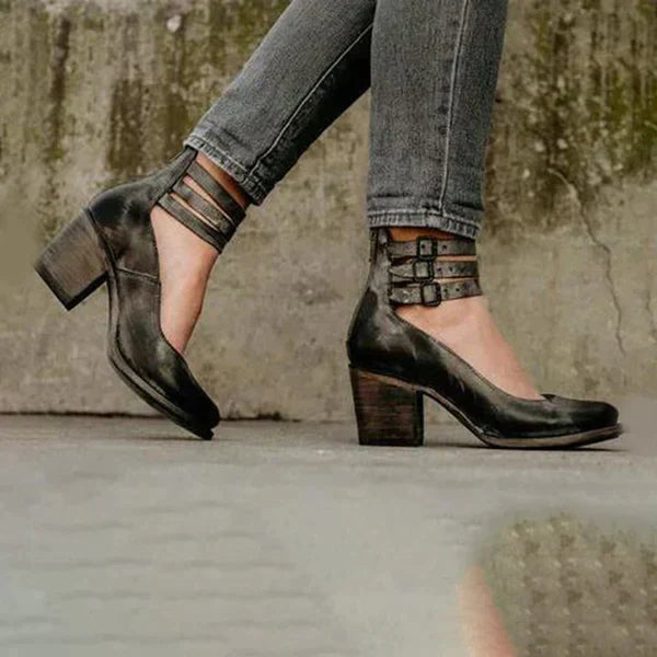 "Elegant women's block heel ankle boots in black, with round toe and back zipper, perfect for chic and comfortable wear."