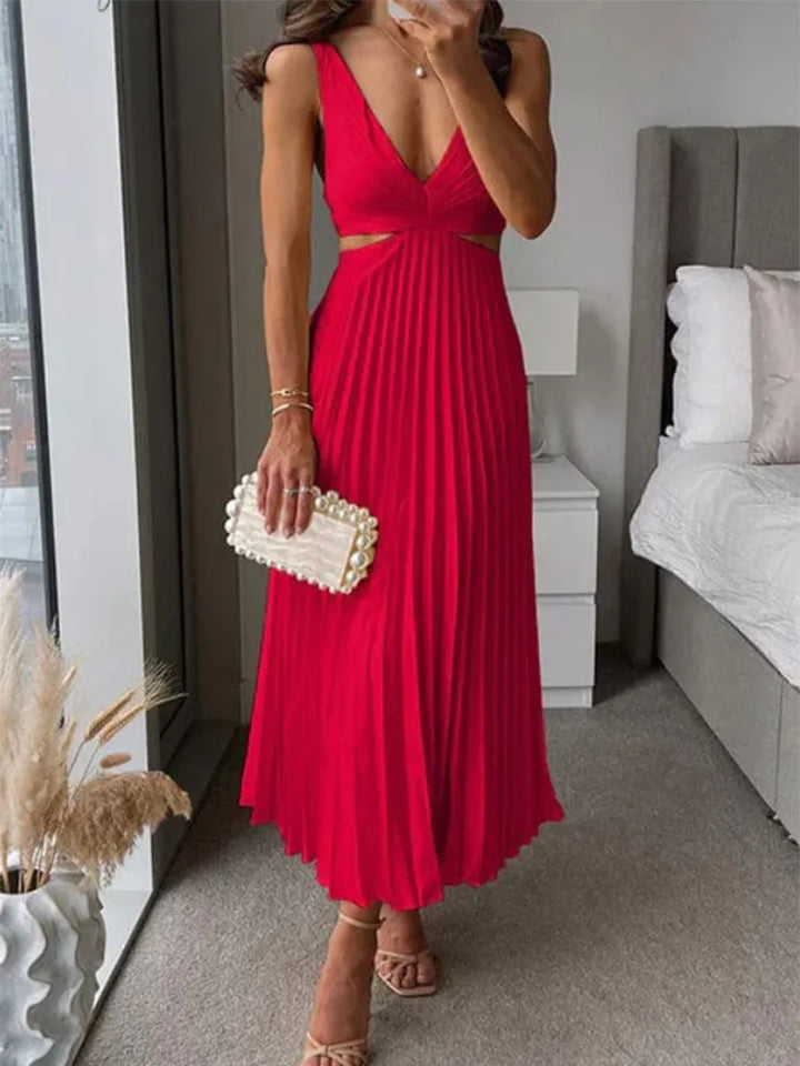 Elegant women's maxi dress with v-neck, cut-out waist, and pleated skirt, showcasing flowing sophistication and silhouette ac