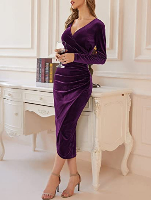 Elegant women's velvet midi dress with long sleeves, showcasing a fitted silhouette, perfect for formal occasions.