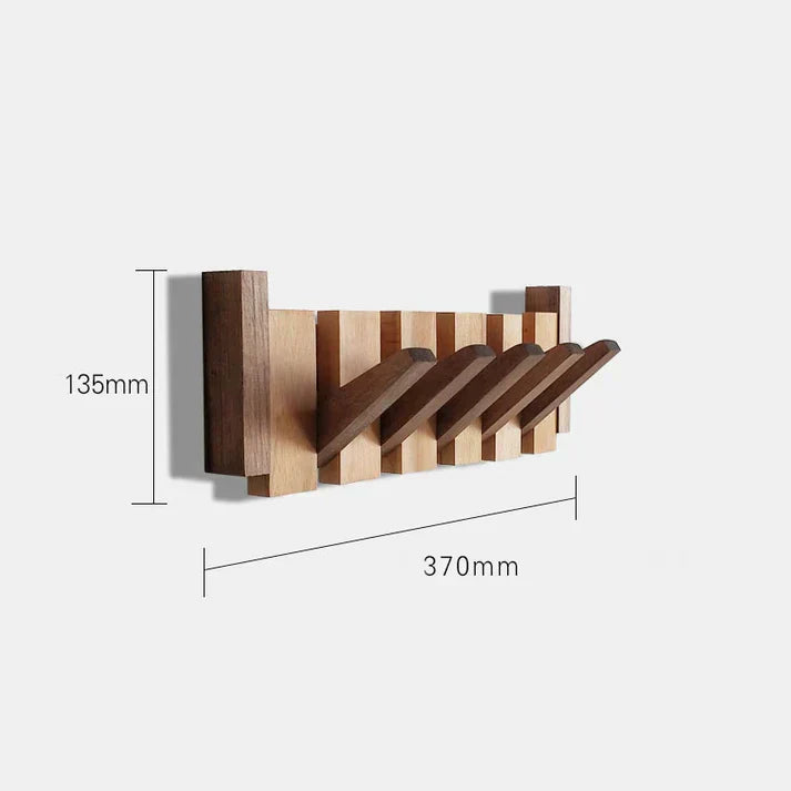 Stylish wooden piano key coat rack, functional art for home decor. Space-saving wall storage.