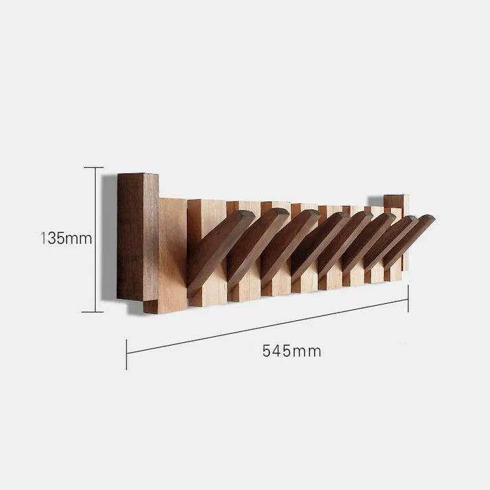 Functional wooden piano key coat rack, stylish home decor. Wall-mounted entryway organizer.