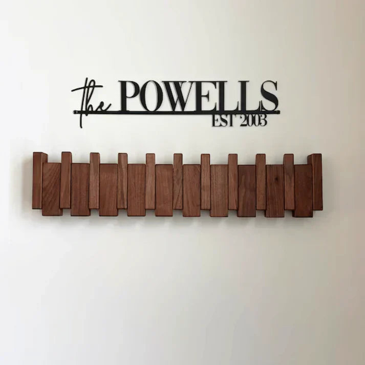 Stylish wooden piano key coat rack. Functional art for hallway organization, elegant home decor.