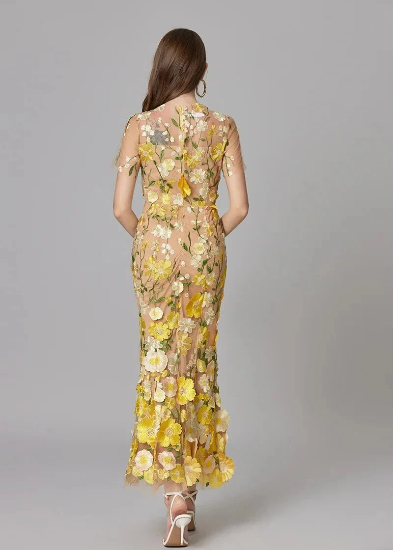 Women's elegant maxi dress, a mermaid floral gown with sheer elements perfect for special occasions.