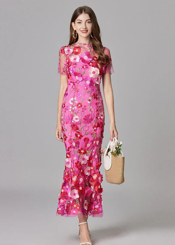 Gorgeous purple formal maxi dress, adorned with 3D flowers and a chic sheer mermaid silhouette.