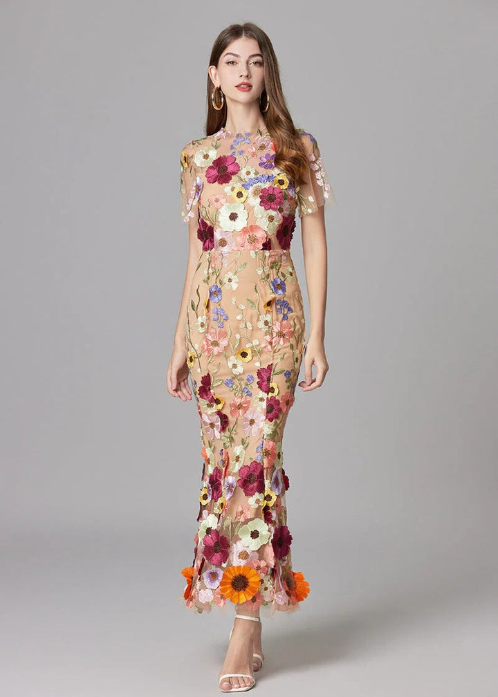 Mermaid silhouette maxi dress, with stunning 3D floral details and an elegant sheer top design.