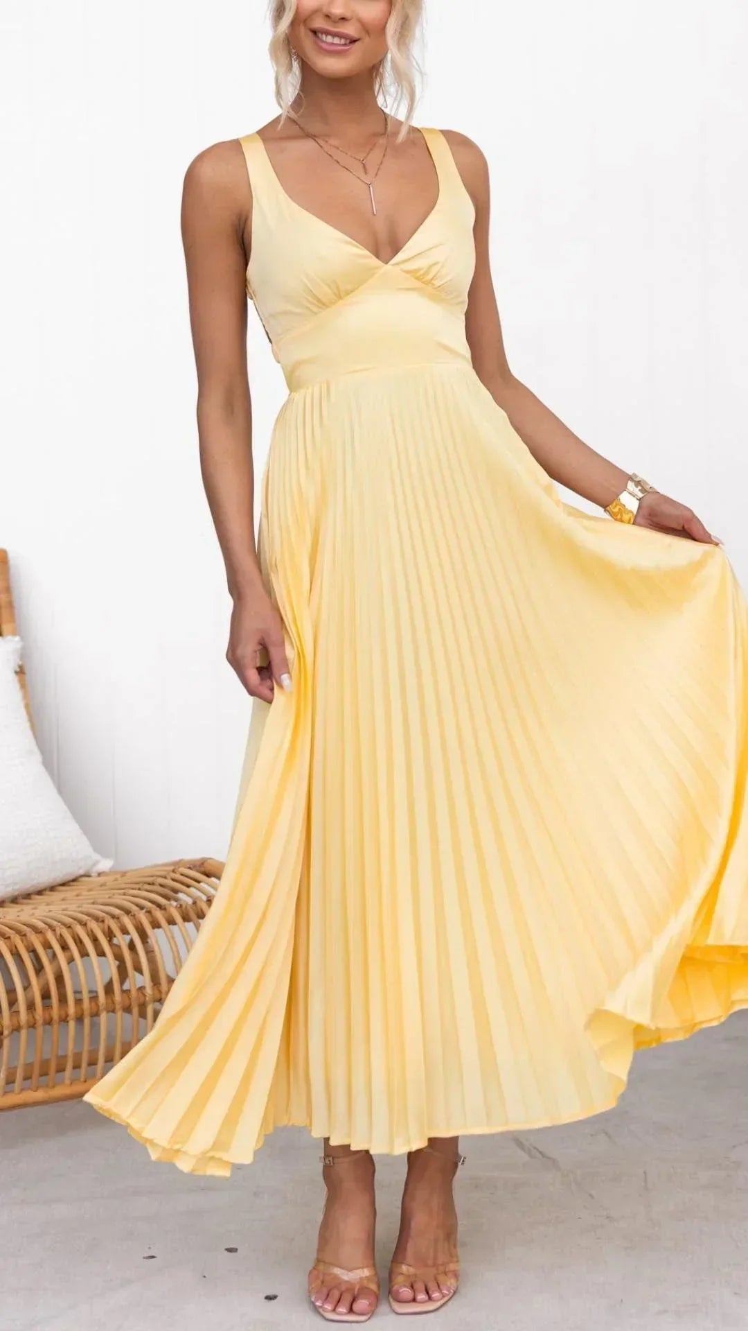 Elegant yellow pleated V-neck maxi dress for women, ideal for casual and occasion wear