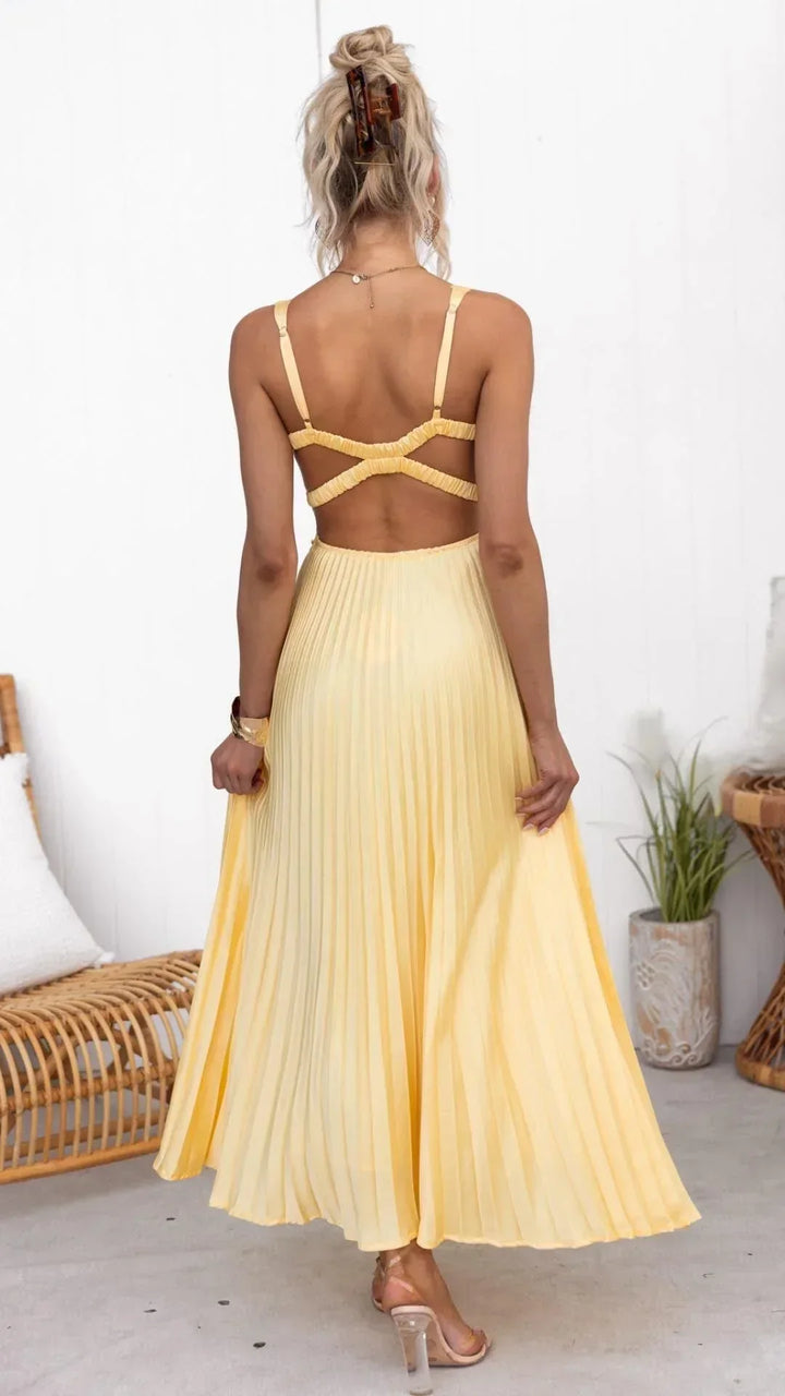 Full shot of a women's casual-yet-elegant yellow pleated V-neck maxi dress